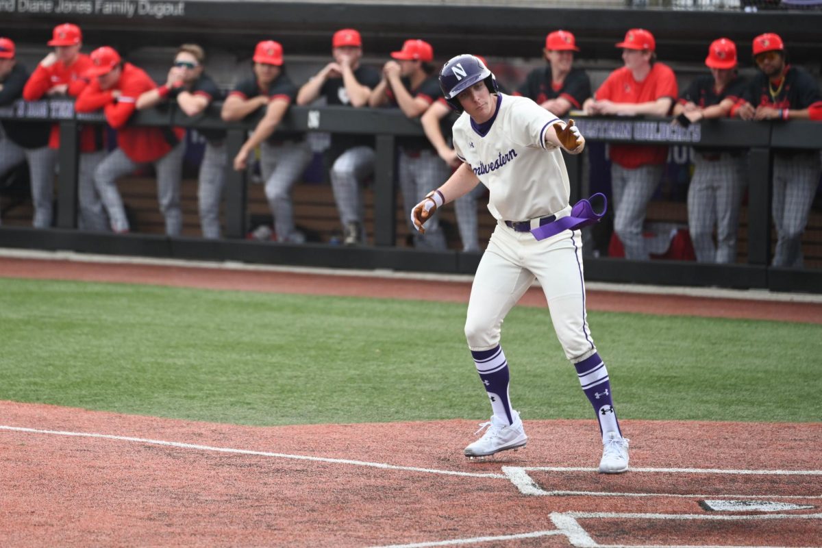 Sophomore infielder Trent Liolios draws a walk in a game earlier this season. Liolios mashed a three-run home run in the first inning of Tuesday’s contest. 