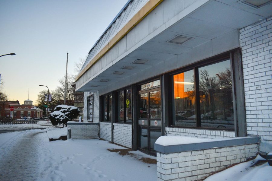 Front of closed Burger King at 1740 Orrington Ave. shown with snow-covered exterior at sunset.